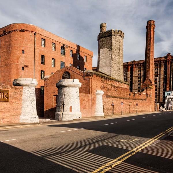 Titanic Hotel entrance with Tobacco Warehouse beyond Image